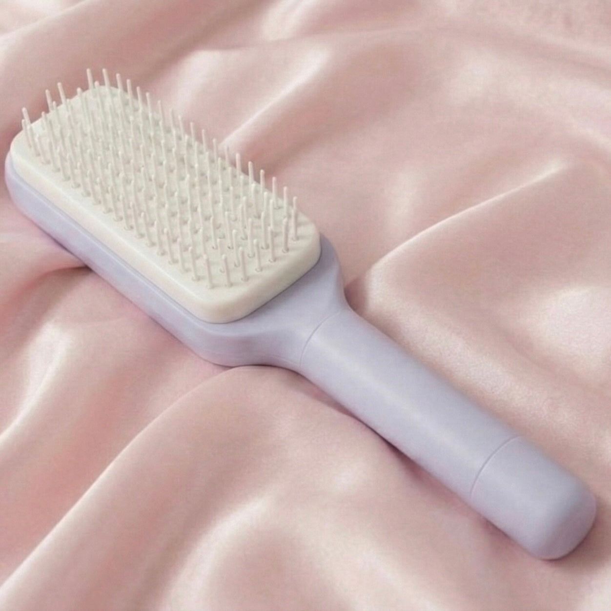 Selbstreinigende Haarbürste